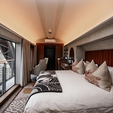 Kruger Shalati - Train On The Bridge & Garden Suites Skukuza Bagian luar foto